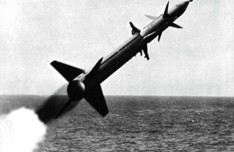 USS Boston (CAG-1) launches a SAM-N-7 Terrier missile, circa in 1960 photo