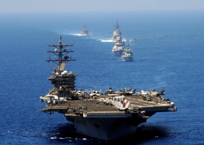 US Navy 090713-N-9988F-094 he aircraft carrier USS Dwight D. Eisenhower (CVN 69) is underway in the Atlantic Ocean during a visit by nearly 100 dignitaries from the North Atlantic Council