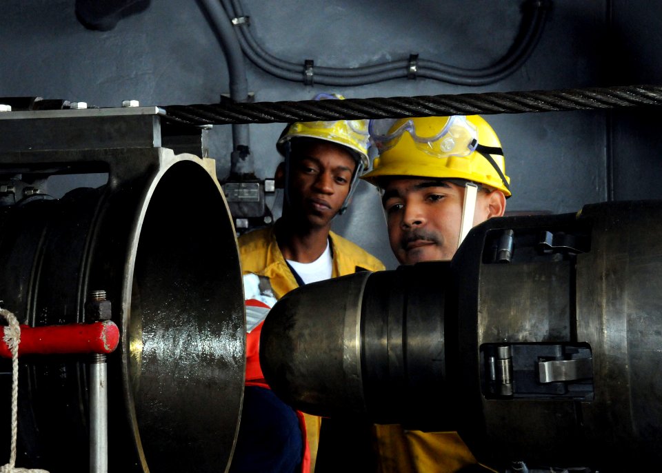 US Navy 090711-N-0120A-078 Rig captain Chief Boatswain's Mate Johan Zorilla, right, and under-instruction rig captain, Boatswain's Mate 2nd Class Emanuel Walker inspect the alignment of a fuel probe