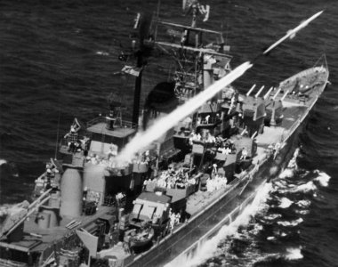 USS Boston (CAG-1) launches a SAM-N-7 Terrier missile, in the late 1950s (K-20424) photo