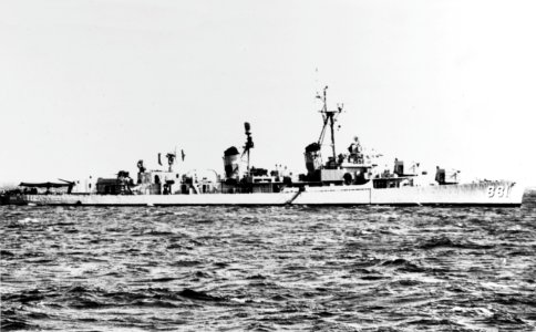 USS Bordelon (DDR-881) at anchor, circa the later 1950s or early 1960s (NH 67508)