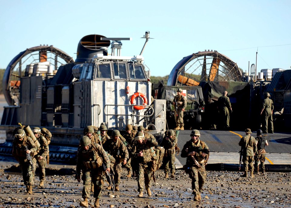 US Navy 090715-N-9520G-135 Marines assigned to the 31st Marine Expeditionary Unit (31st MEU) deployed aboard the amphibious assault ship USS Essex (LHD 2) disembark Landing Craft Air Cushion (LCAC) 21