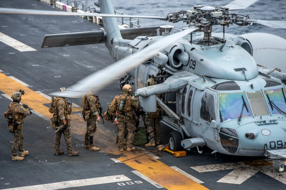 USS Bonhomme Richard, Marines and Sailors on the flight deck 150312-N-UF697-024