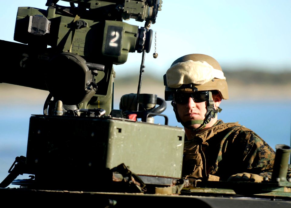 US Navy 090715-N-9520G-062 A Marine assigned to the 31st Marine Expeditionary Unit (31st MEU) deployed aboard the amphibious assault ship USS Essex (LHD 2) stands-by to move out in support of Talisman Saber 2009