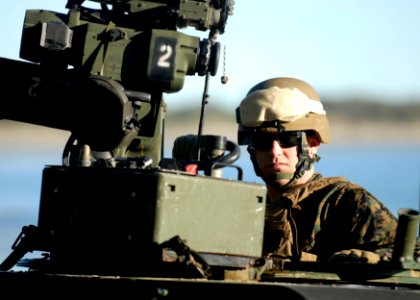 US Navy 090715-N-9520G-062 A Marine assigned to the 31st Marine Expeditionary Unit (31st MEU) deployed aboard the amphibious assault ship USS Essex (LHD 2) stands-by to move out in support of Talisman Saber 2009