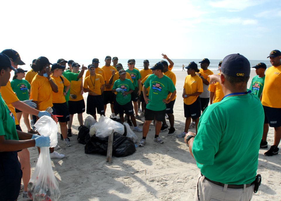 US Navy 090716-N-0486G-002 Sailors from the guided-missile destroyer USS The Sullivans (DDG 68), and civilians participated in Naval Station Mayport's mid-summer beach front clean up