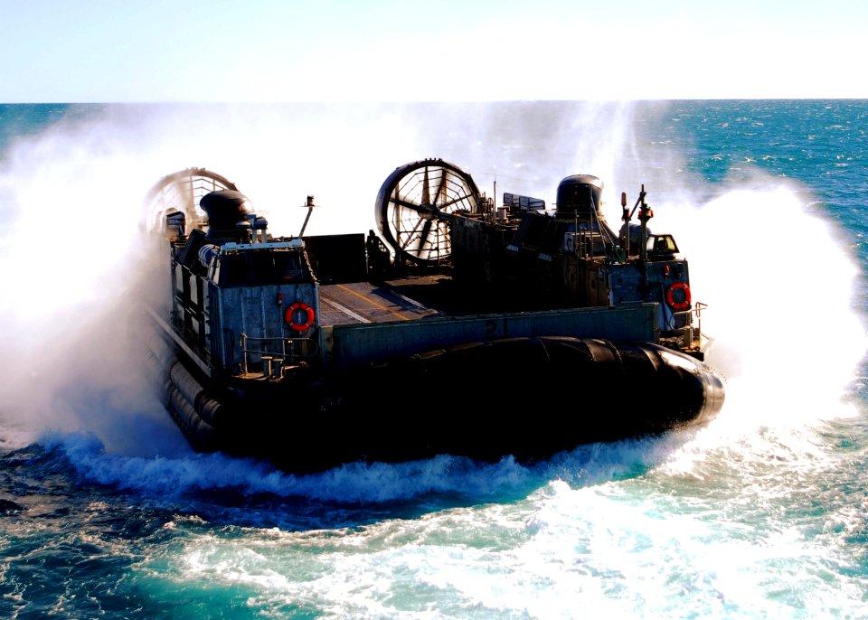 US Navy 090717-N-5538K-012 A landing craft air cushion prepares to enter the well deck of the amphibious transport dock ship USS Denver (LPD 9) during a Talisman Saber 2009 training exercise