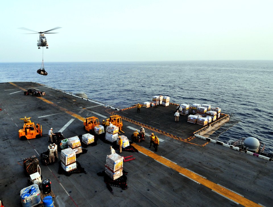 US Navy 090716-N-9740S-038 An SA-330 Puma helicopter assigned to the Military Sealift Command combat stores ship USNS San Jose (T-AFS 7), delivers cargo to the amphibious assault ship USS Bataan (LHD 5)