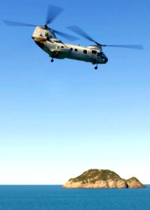 US Navy 090716-N-9950J-366 A CH-46E Sea Knight helicopter turns away shortly after lift-off from Essex during a mock amphibious assault as part of exercise Talisman Saber 2009
