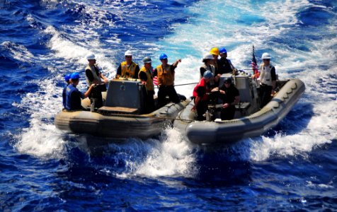 US Navy 090717-N-4774B-025 Rigid-hull inflatable boats from the guided-missile cruiser USS Lake Champlain (CG 57) perform maneuvers during small boat operations