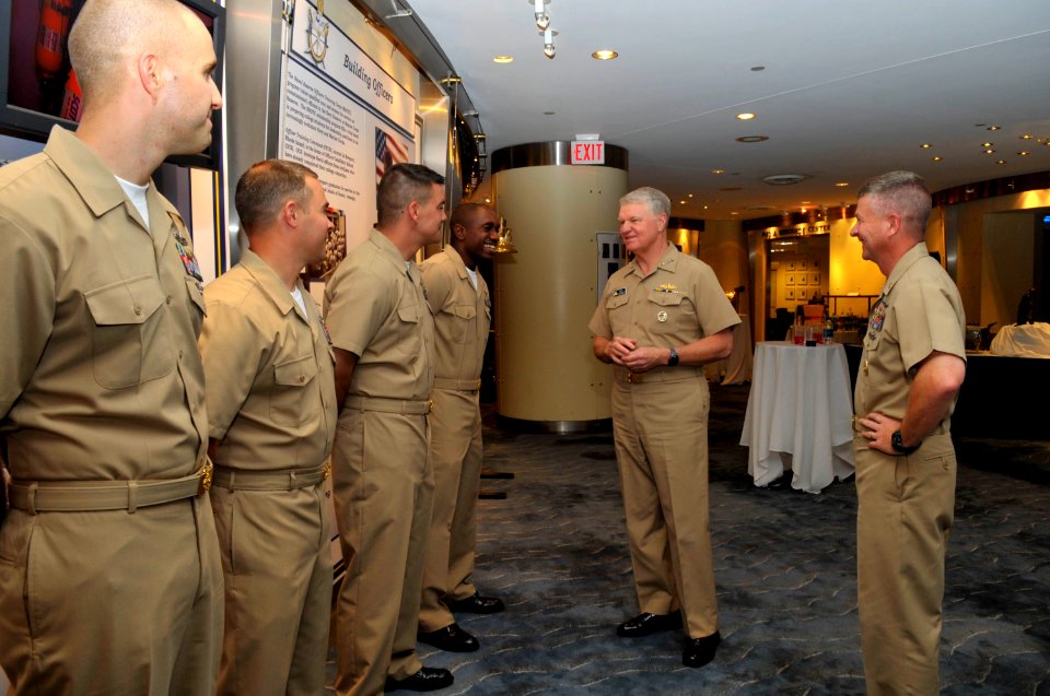 US Navy 090716-N-8273J-009 Chief of Naval Operations (CNO) Adm. Gary Roughead, middle, and Master Chief Petty Officer of the Navy (MCPON) Rick West, right, speak with the Sailors of the Year