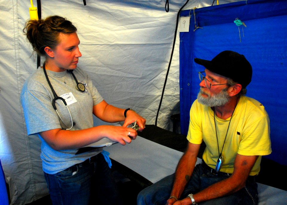 US Navy 090717-N-6326B-005 Staff members from Naval Medical Center, San Diego provide medical care to homeless veterans during the 22nd annual Homeless Veterans Stand Down
