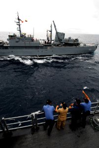 US Navy 090718-N-7092S-420 Sailors watch the Colombian Navy replenishment ship ARC Buenaventura (BM 162) from the guided-missile frigate USS Kauffman (FFG 59)