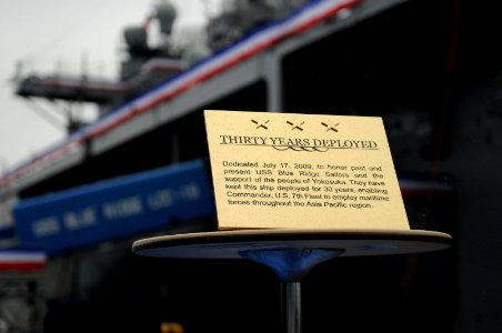 US Navy 090717-N-7280V-205 The plaque commemorating the 30th anniversary of the arrival of the amphibious command ship USS Blue Ridge (LCC 19) as part of the U.S. Navy Forward Deployed Naval Force is unveiled during an annivers