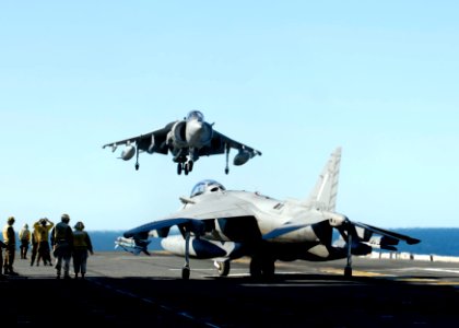US Navy 090717-N-9520G-078 An AV-8B Harrier lands aboard the amphibious assault ship USS Essex (LHD 2) during a Talisman Saber 2009 exercise