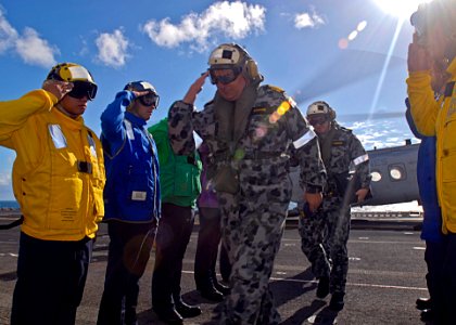 US Navy 090720-N-9950J-029 Royal Australian Navy Chief of Navy, Vice Adm. Russ Crane, is piped aboard the forward-deployed amphibious assault ship USS Essex (LHD 2)