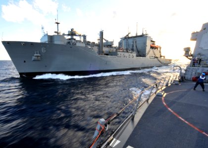 US Navy 090718-N-2638R-003 The Military Sealift Command dry cargo-ammunition ship USNS Amelia Earhart (T-AKE 6) is underway with the Arleigh Burke-class guided-missile destroyer USS Mustin DDG (89) photo