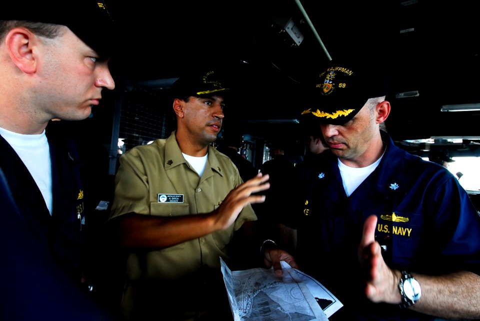 US Navy 090719-N-7092S-043 A Colombian Navy officer explains the safest navigation route while pulling into Bahia Malaga, Colombia