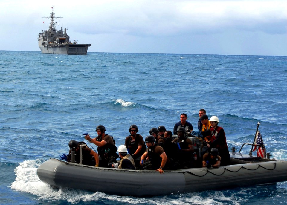 US Navy 090720-N-5538K-148 Sailors assigned to the forward-deployed amphibious transport dock USS Denver (LPD 9) Visit, Board, Search and Seizure team prepare to board landing craft utility 1627 during a Talisman Saber 2009 tr