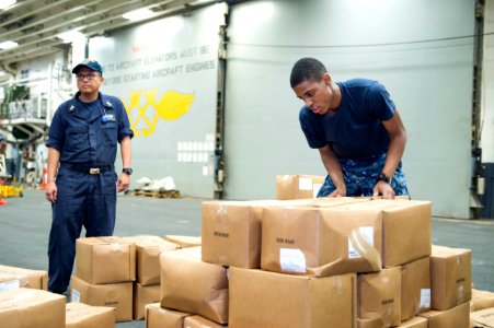 USS Bonhomme Richard (LHD 6) Stores Offload 161121-N-XK809-018