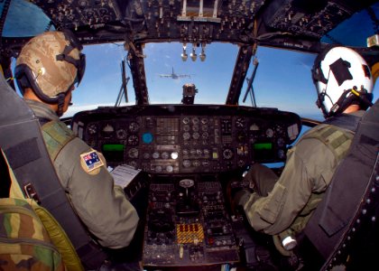 US Navy 090721-N-9950J-314 Marine Capt. Erick Min and Marine Capt. Nathan Mahoney, assigned to Marine Medium Helicopter Squadron (HMM) 262, pilots a CH-53E Sea Stallion helicopter during an in-flight refueling