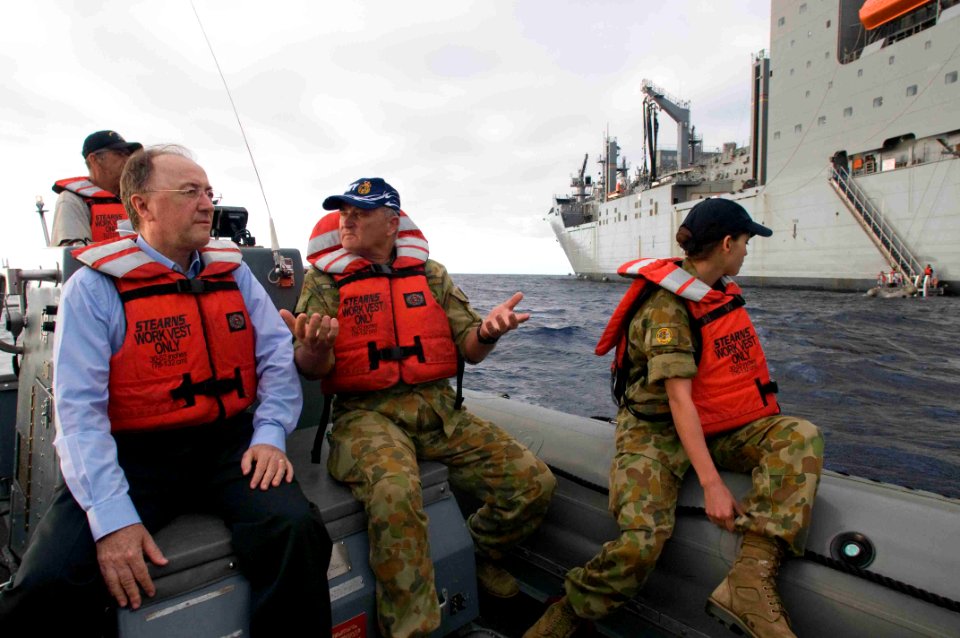 US Navy 090720-N-9689V-010 ustralian High Commissioner to the Kingdom of Tonga Bruce Hunt, left, approaches the Military Sealift Command dry cargo-ammunition ship USNS Richard E. Byrd (T-AKE 4) for a tour of the ship