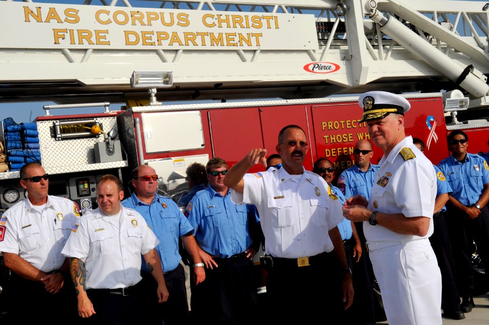 US Navy 090721-N-8273J-297 Chief of Naval Operations (CNO) Adm. Gary Roughead speaks with Navy civilian firefighters at the fire training tower while visiting Naval Air Station Corpus Cristi