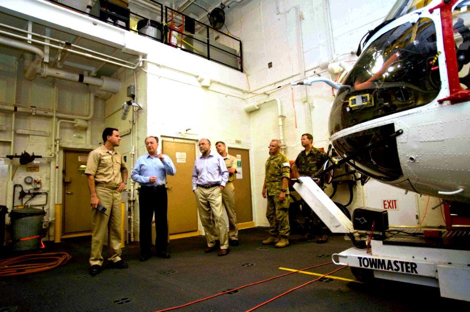 US Navy 090720-N-9689V-011 Australian High Commissioner to the Kingdom of Tonga Bruce Hunt observes the hangar bay during a tour of the Military Sealift Command dry cargo-ammunition ship USNS Richard E. Byrd (T-AKE 4)
