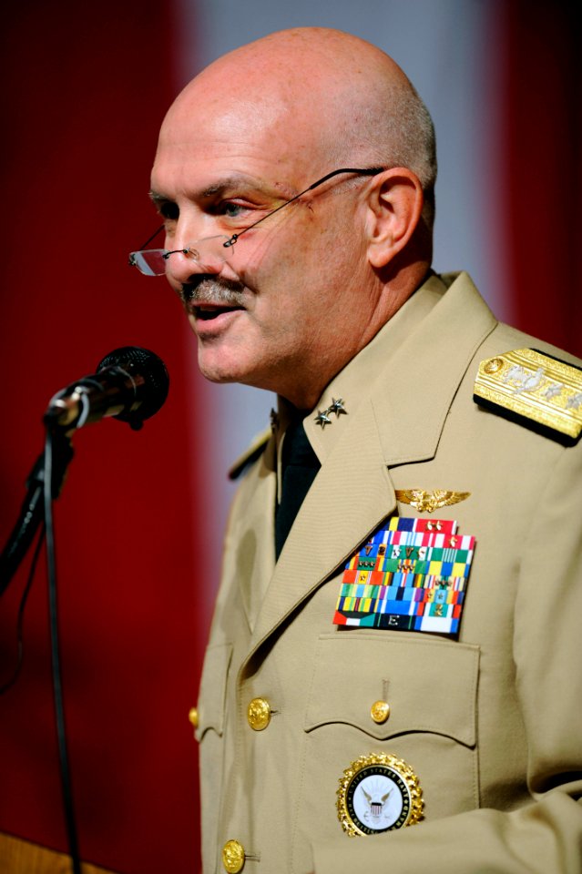 US Navy 090723-N-0555B-189 Rear Adm. Joseph Kilkenny makes remarks before reading his official orders during a change of command ceremony