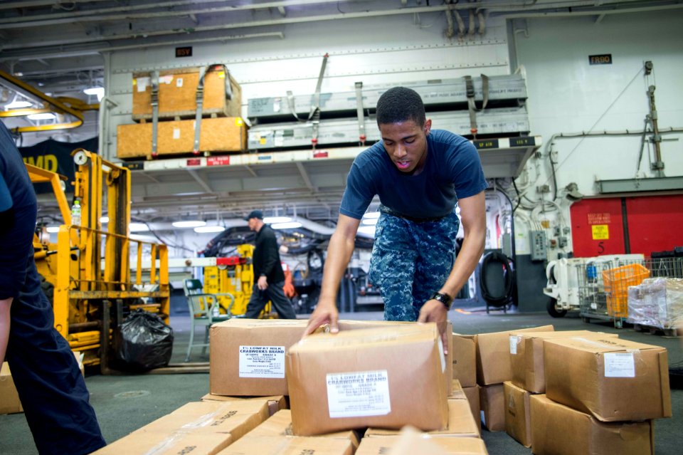 USS Bonhomme Richard (LHD 6) Stores Offload 161121-N-XK809-015