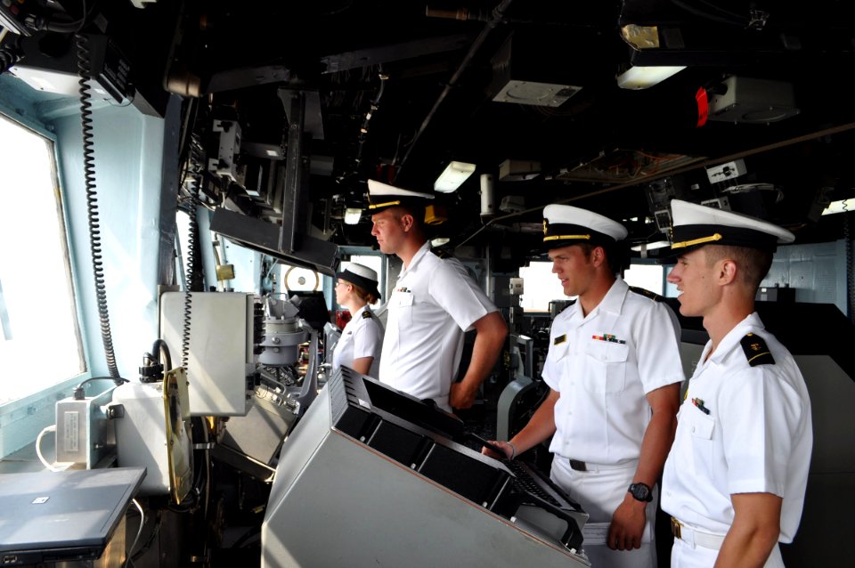US Navy 090722-N-4124C-001 U.S. Naval Academy midshipmen inspect bridge equipment aboard the guided-missile cruiser USS Normandy (CG 60)