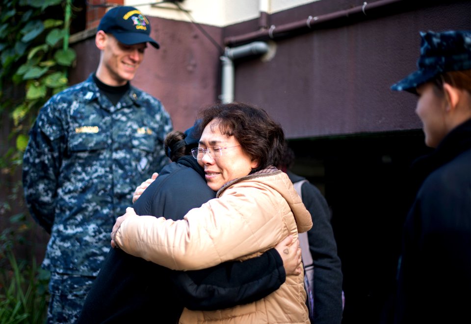 USS Bonhomme Richard (LHD 6) Sailors participate in a Food Drive 170123-N-WF272-027