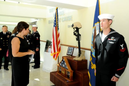 US Navy 090720-N-5821P-028 Visitors pay respect at the conclusion of a memorial service at Naval Air Station (NAS) Sigonella, NAS 1 Chapel for Explosive Ordnance Disposal Technician 2nd Class Tony M. Randolph
