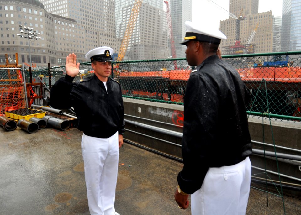 US Navy 090721-N-4236E-091 Chief Fire Controlman Gregory Smith reenlists at Ground Zero while visiting New York during a port visit for the guided-missile destroyer USS Mahan (DDG 72)