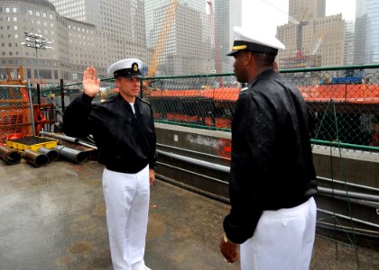 US Navy 090721-N-4236E-091 Chief Fire Controlman Gregory Smith reenlists at Ground Zero while visiting New York during a port visit for the guided-missile destroyer USS Mahan (DDG 72)