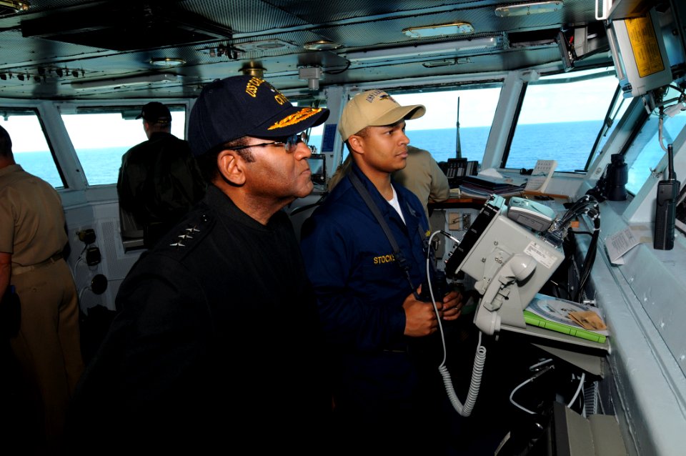 US Navy 090720-N-7456N-057 Commander, U.S. Second Fleet, Vice Adm. Mel Williams Jr. speaks to Lt. j.g. Byron Stocks aboard the aircraft carrier USS Carl Vinson's (CVN 70) Navigation Bridge as Stocks stands watch as the Officer