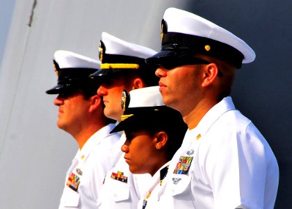 US Navy 090724-N-4774B-062 Sailors aboard the guided-missile cruiser USS Lake Champlain (CG 57) observe the USS Missouri and the USS Arizona memorials while transiting Pearl Harbor