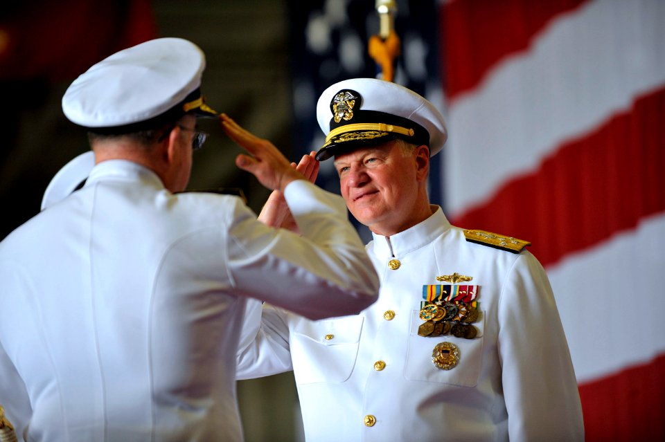 US Navy 090724-N-8273J-133 Chief of Naval Operations (CNO) Adm. Gary Roughead, left, salutes Adm. John C. Harvey, Jr. during the change of command ceremony for U.S. Fleet Forces