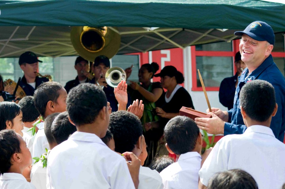 US Navy 090724-N-9689V-002 Musician 1st Class Jeremy Ward and other members of the Pacific Fleet Band perform at Faleloa Primary School during a Pacific Partnership 2009 community service project