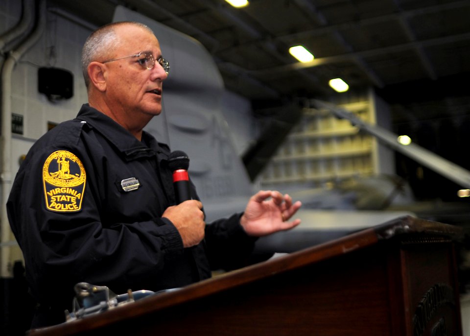 US Navy 090722-N-9988F-054 Virginia State Trooper Jim Reynolds speaks to the crew of the Nimitz-class aircraft carrier USS Dwight D. Eisenhower (CVN 69)