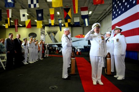 US Navy 090724-N-1810F-031 Adm. John C. Harvey, Jr. is piped aboard the aircraft carrier USS Harry S. Truman (CVN 75)