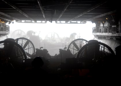US Navy 090723-N-5148B-031 A Marine from the 11th Marine Expeditionary Unit observes Landing Craft Air Cushion launch from the well deck aboard the USS Bonhomme Richard (LHD 6)
