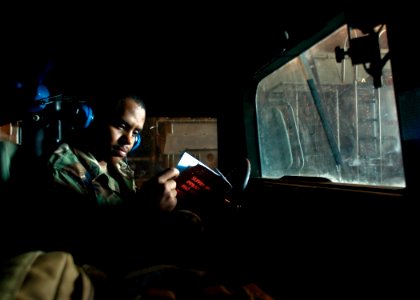 US Navy 090723-N-5253W-004 Quartermaster 1st Class Melvin Cassidy, from Biscoe, N.C. assigned to Beach Master Unit (BMU) 1, sits in a humvee aboard a landing craft air cushion (LCAC)