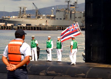 US Navy 090723-N-5476H-417 Sailors man topside of the Virginia-class attack submarine USS Hawaii (SSN 776) during their arrival to Pearl Harbor
