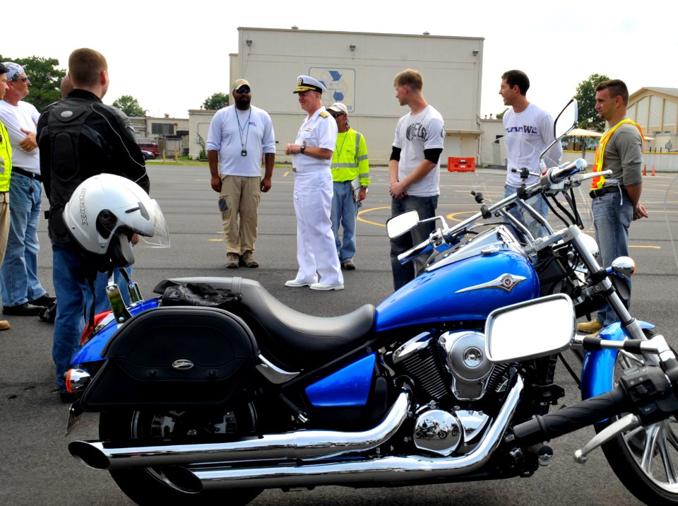 US Navy 090724-N-8273J-283 Chief of Naval Operations (CNO) Adm. Gary Roughead, center, speaks with Sailors attending a motorcycle safety course at Naval Air Station Oceana