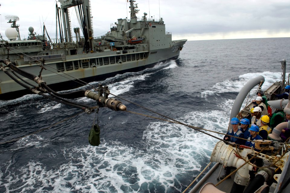 US Navy 090722-N-9123L-055 The Royal Australian Navy replenishment oiler HMAS Success (AOR 304) sends a fuel probe to the guided-missile destroyer USS McCampbell (DDG 85) during an underway replenishment