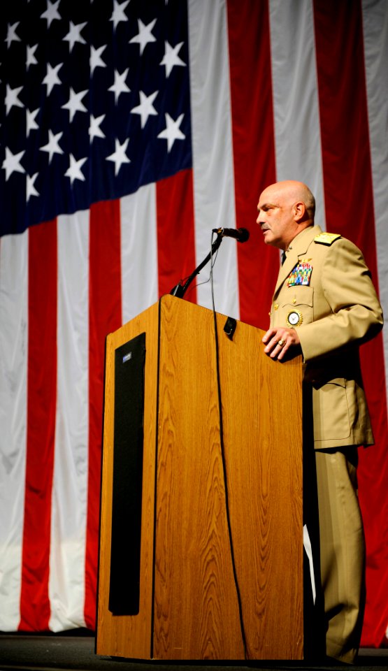 US Navy 090723-N-0555B-153 Rear Adm. Joseph Kilkenny makes remarks before reading his official orders during a change of command ceremony