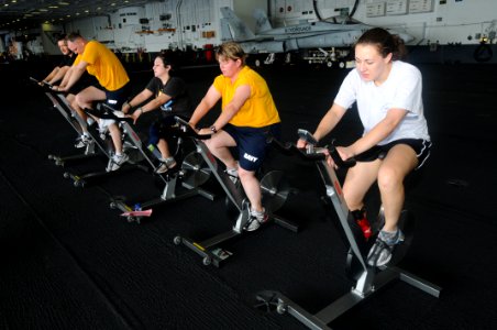 US Navy 090725-N-7456N-041 Sailors participate in a spin cycle class aboard the aircraft carrier USS Carl Vinson (CVN 70)