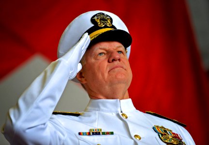 US Navy 090724-N-8273J-014 Chief of Naval Operations (CNO) Adm. Gary Roughead salutes during the presentation of colors during the change of command ceremony for U.S. Fleet Forces Adm. Jonathan W. Greenert and Adm. John C. Harv