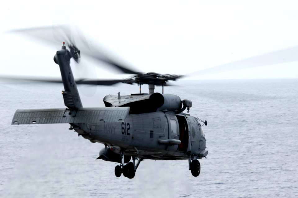 US Navy 090727-N-3038W-104 An SH-60F Sea Hawk helicopter assigned to the Indians of Helicopter Anti-Submarine Squadron (HS) 6 takes off from the aircraft carrier USS Nimitz (CVN 68)